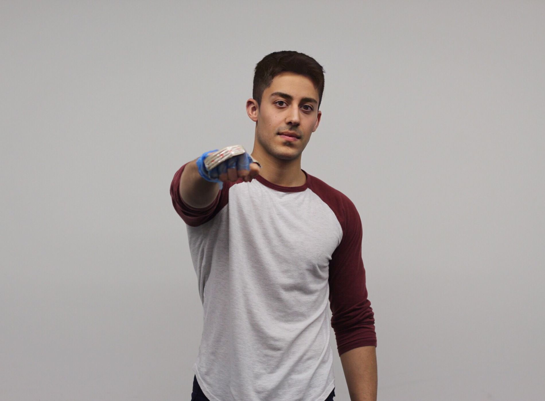 Mory Naimi at Imperial College designing sports injury prevention devices, including a knuckle impact measurement device for boxing injuries.